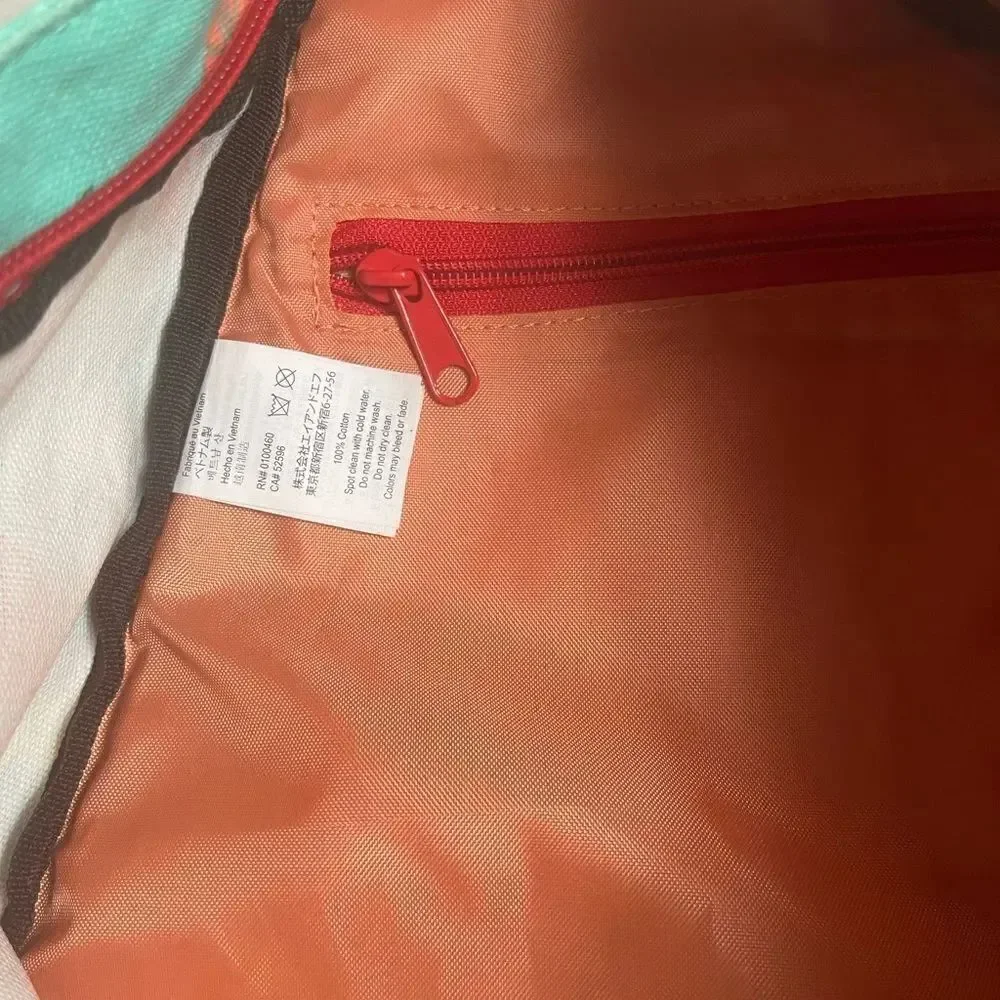 Kavu rope sling back canvas mint green with Orange,yellow, green fruit prints.